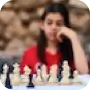 An image of a girl playing chess